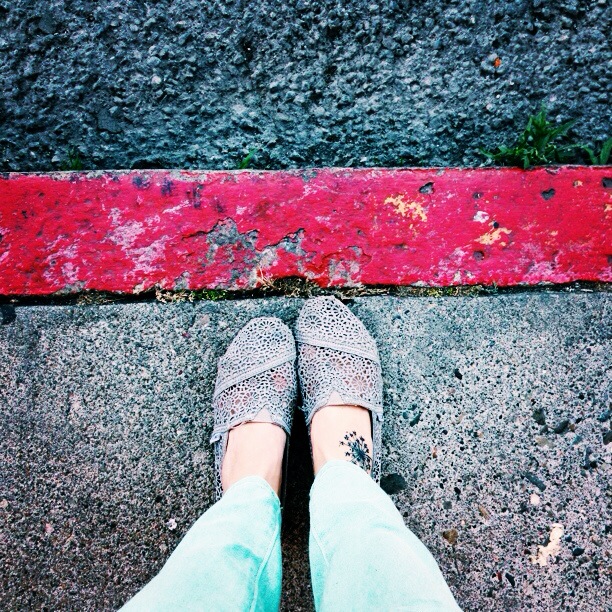 feet on the street of San Francisco